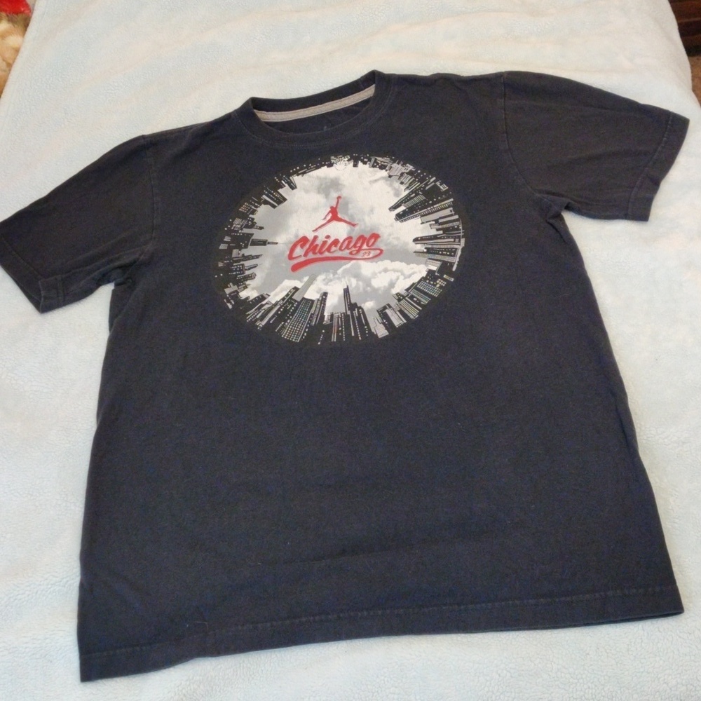 Jordan shirt with Chicago displayed in the middle